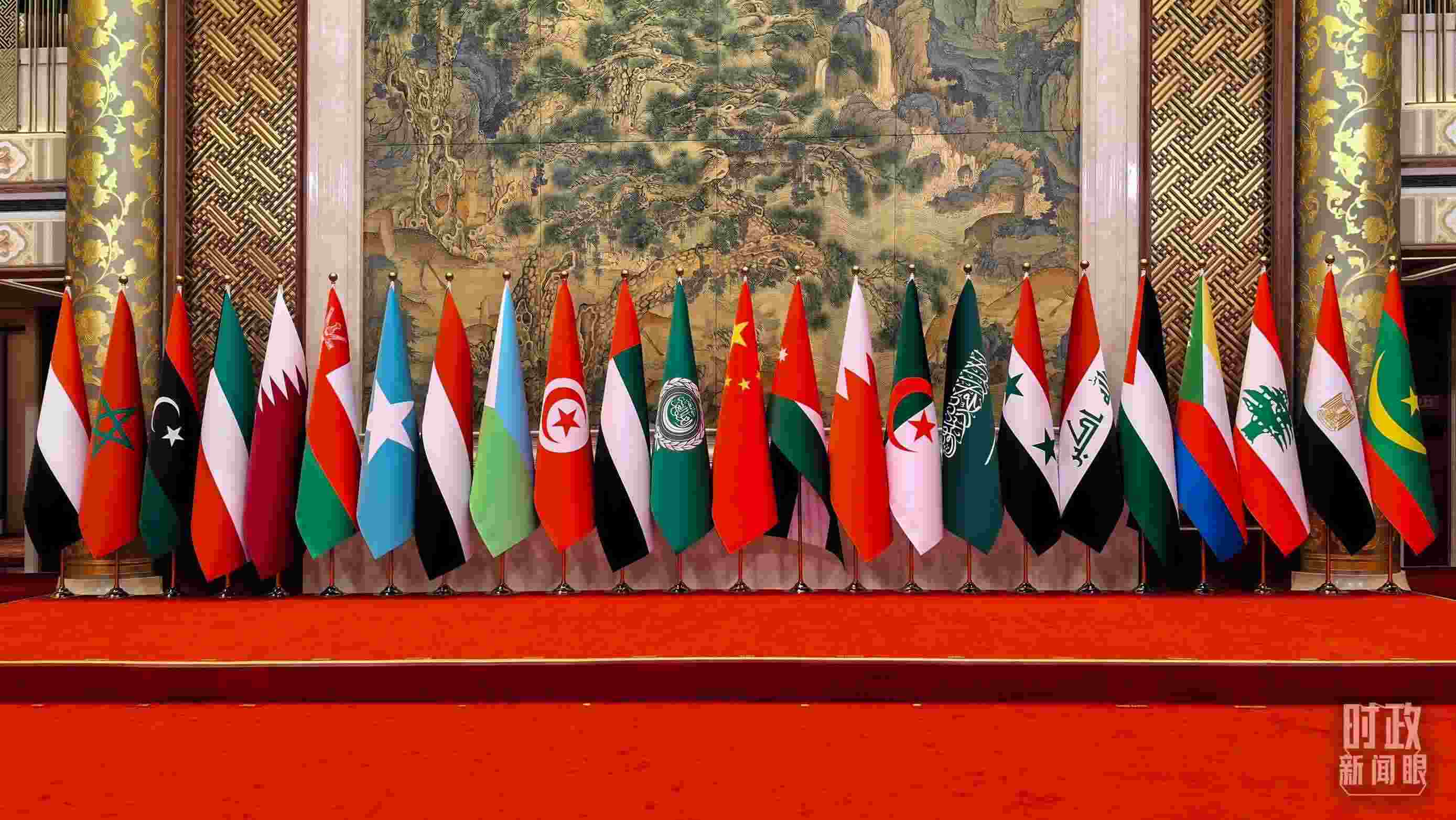 △會議現(xiàn)場的集體合影區(qū)。（總臺央廣記者潘毅拍攝）