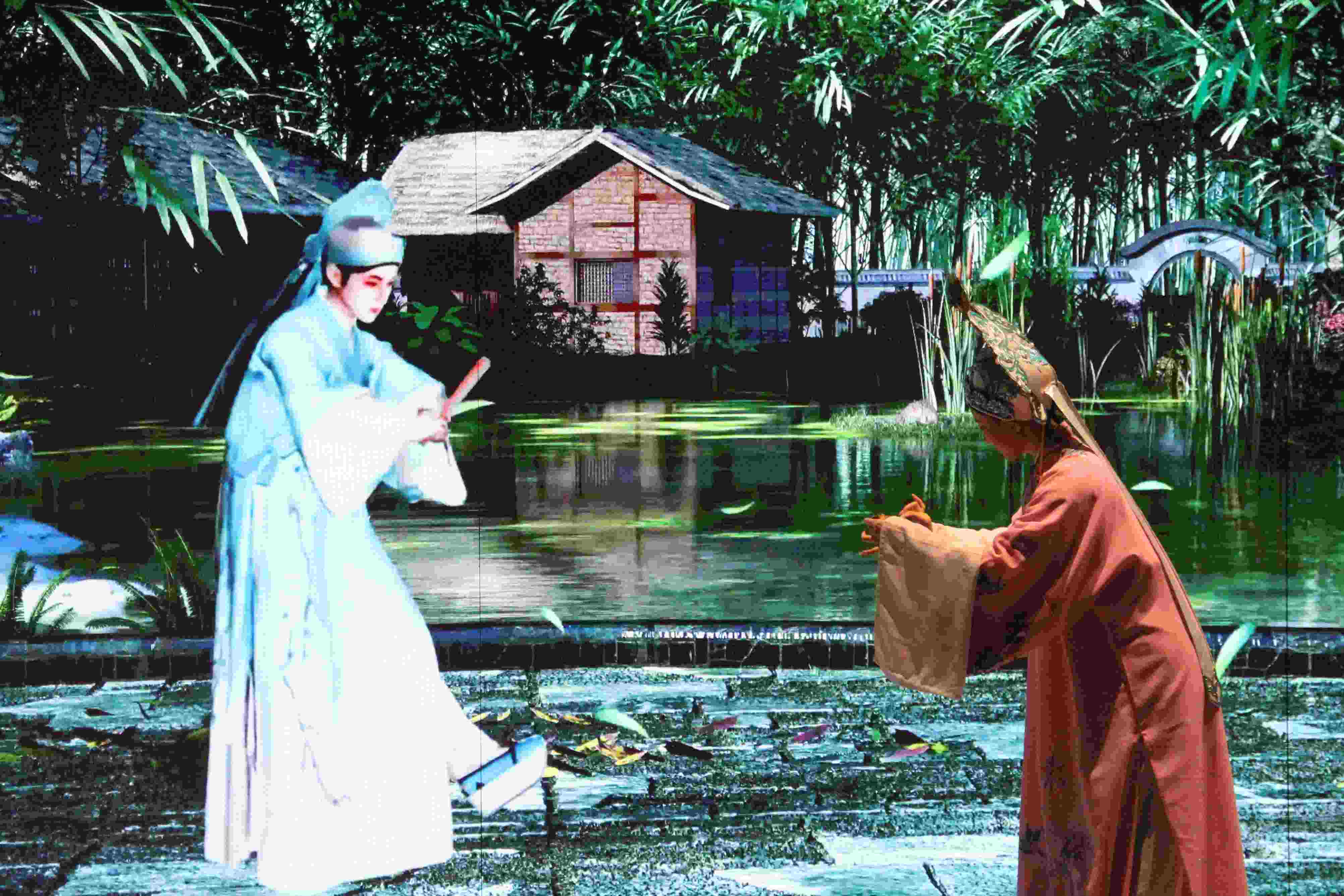 真人演員與虛擬人演員在“元啟金陵”南京數(shù)字文化客廳出演《梁山伯與祝英臺(tái)》經(jīng)典選段。受訪者供圖