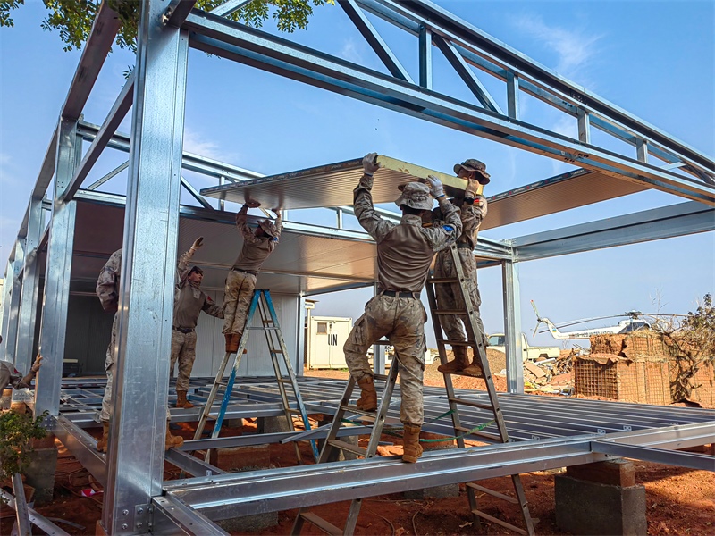 小組協(xié)同推進工程任務(wù)。鄧原淘攝